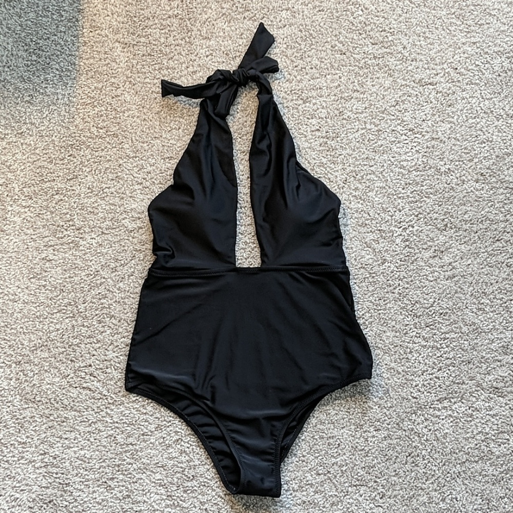 Black one piece suit